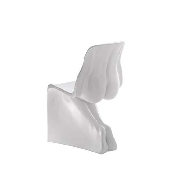 "Her Glossy chair by Casamania, designed by Fabio Novembre, features a sculpted female form in glossy painted polyethylene, inspired by the Panton Chair and crafted using 3D scanning of plaster sculptures."
