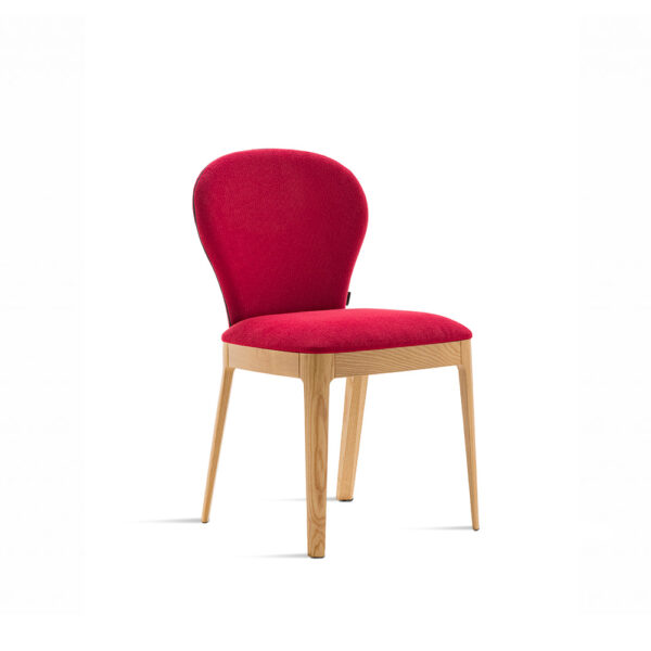 "Milady upholstered chair by Casamania & Horm, designed by Studio Balutto, featuring a sinuous Art Deco-inspired silhouette, solid ash wood frame, and padded seat and backrest available in fabric, faux leather, or leather."