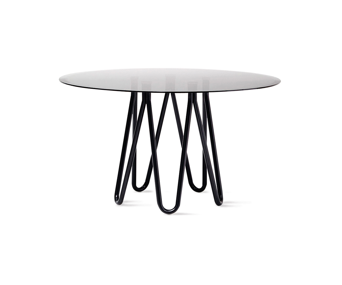 Meduse Glass Table by Casamania & Horm – Designed by GamFratesi, featuring a round smoked glass top (130 cm diameter) supported by a sculptural painted metal base, inspired by the symmetrical form of a jellyfish.