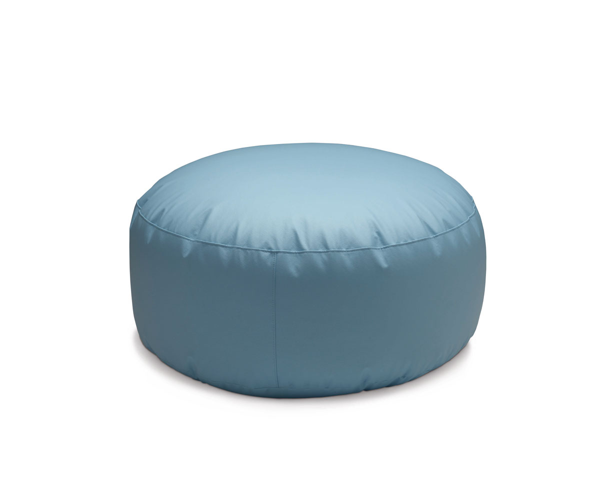 A cylindrical pouf with a rounded shape, filled with expanded polystyrene balls and covered in fabric or faux leather, suitable for both indoor and outdoor use.