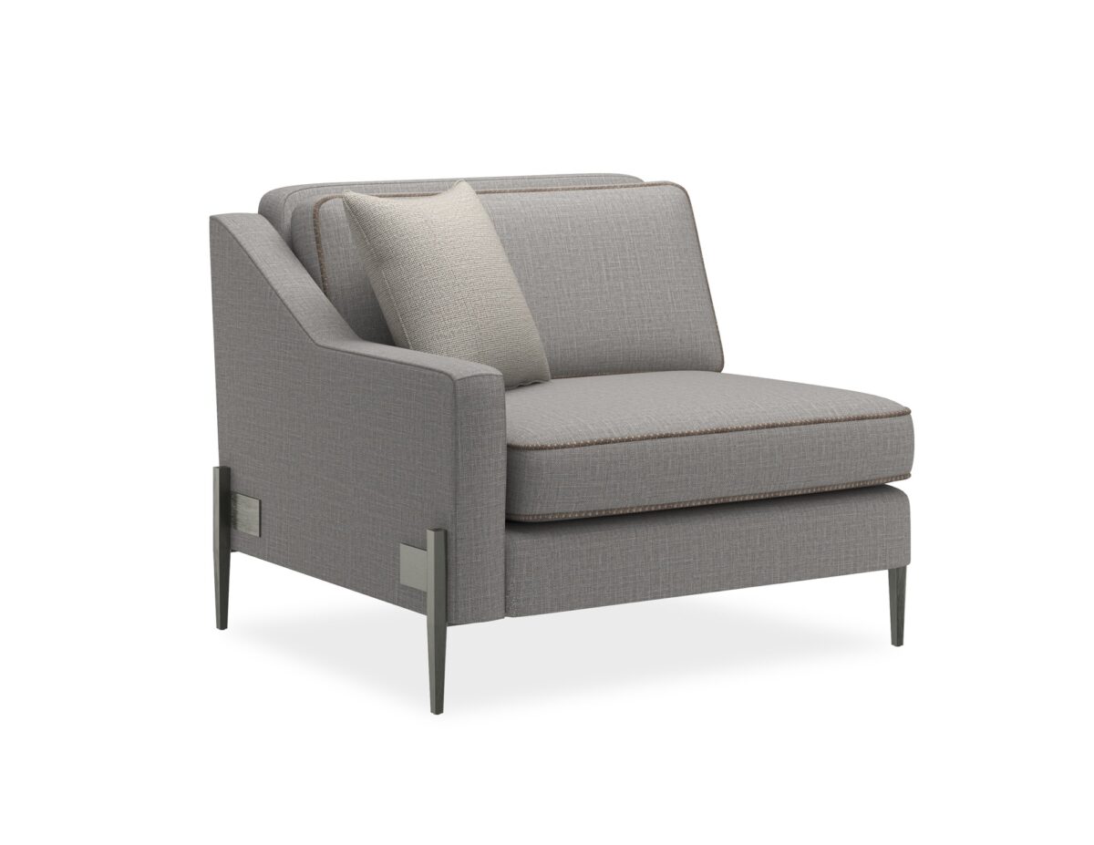 A sleek left-arm chair with a suspended frame, Smoked Stainless metal legs, and grey wool blend upholstery with tan leather welt.