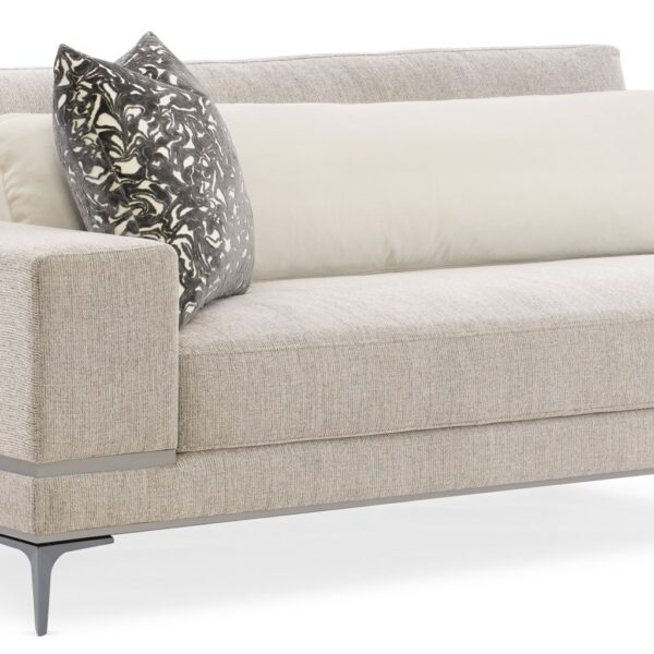 Repetition LAF Loveseat by Caracole – Elegant modern seating for luxury living rooms." Let me know if you'd like any changes!