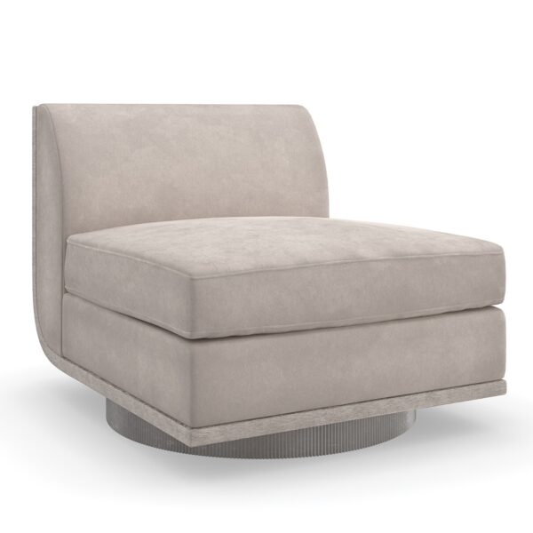 Clipper armless chair from Caracole, showcasing its distinctive curved back and upholstered in two-tone fabric.