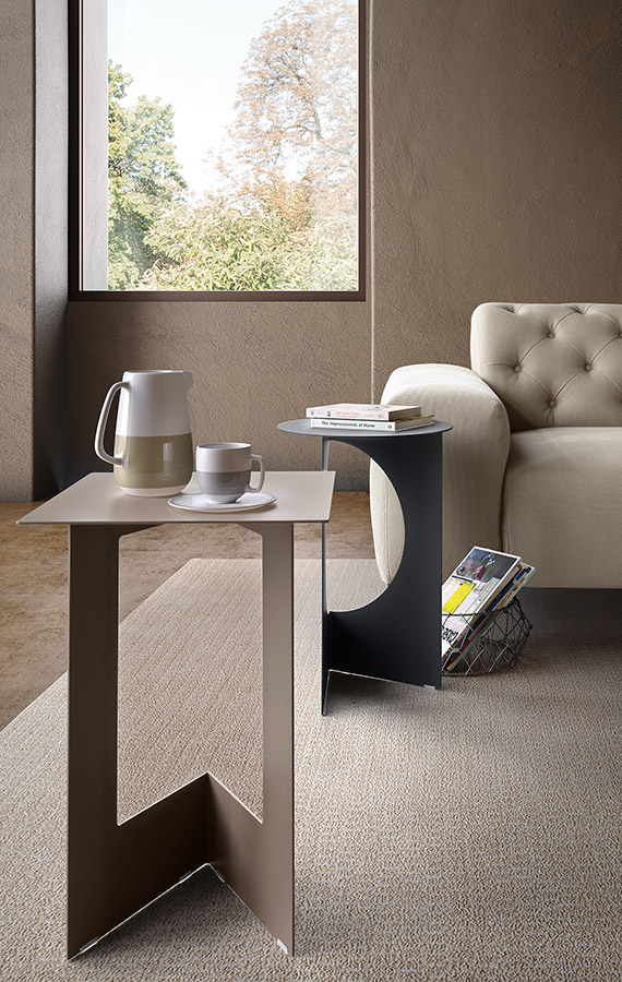 “Duetto by Pianca – modern Italian upholstered armchair with sleek, rounded design”