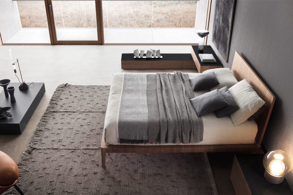 “Side view of Spillo by Pianca – elegant contemporary table with slender silhouette and refined lines”
