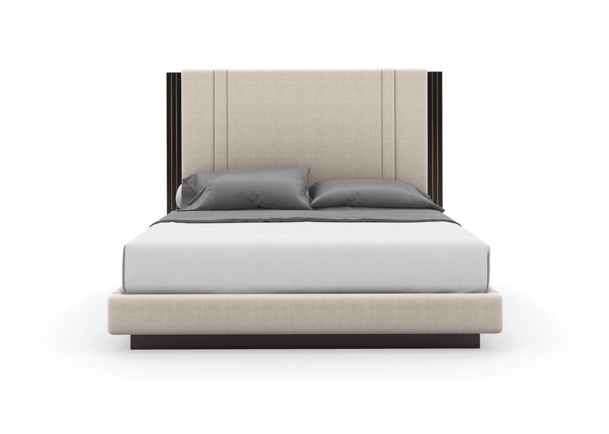 Caracole Decent Proposal King Bed featuring a light-toned performance fabric upholstered headboard, footboard, and side rails, with Dark Chocolate trim and Champagne Gold metal inlay accents, set on a Dark Chocolate plinth base.