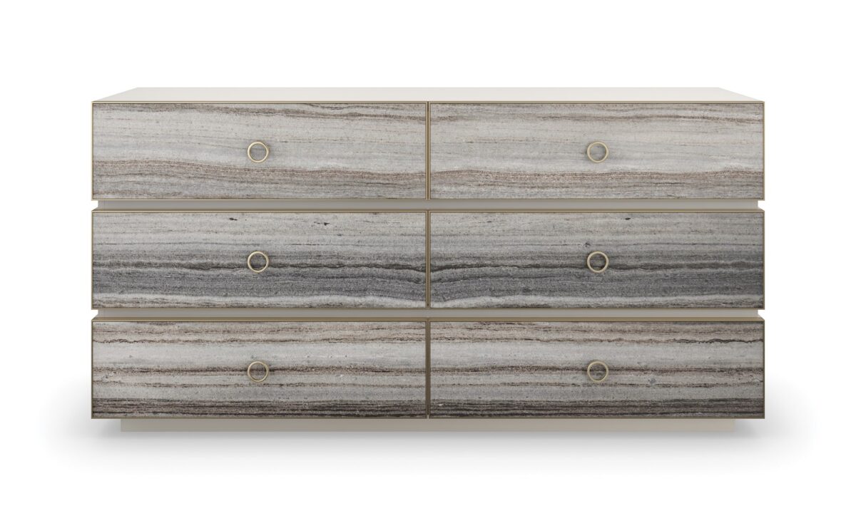 Modern dresser with a textured, layered facade and a sleek, low-profile design, BEDROCK Dresser by Caracole.