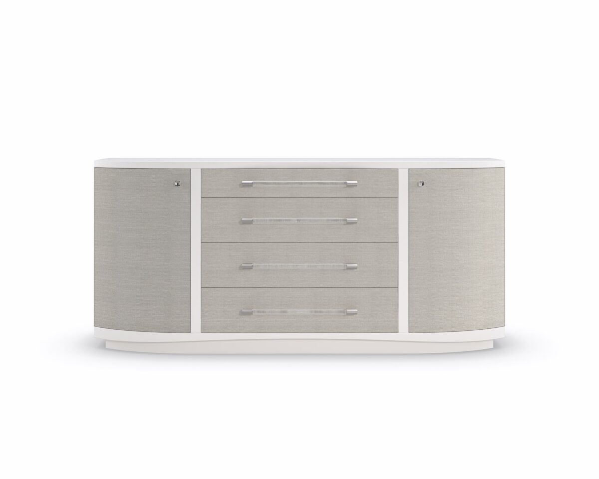 Front view of the Clear To Me dresser by Caracole in pearly white case, with four sun‑kissed silver raffia‑front drawers and sleek acrylic pulls.