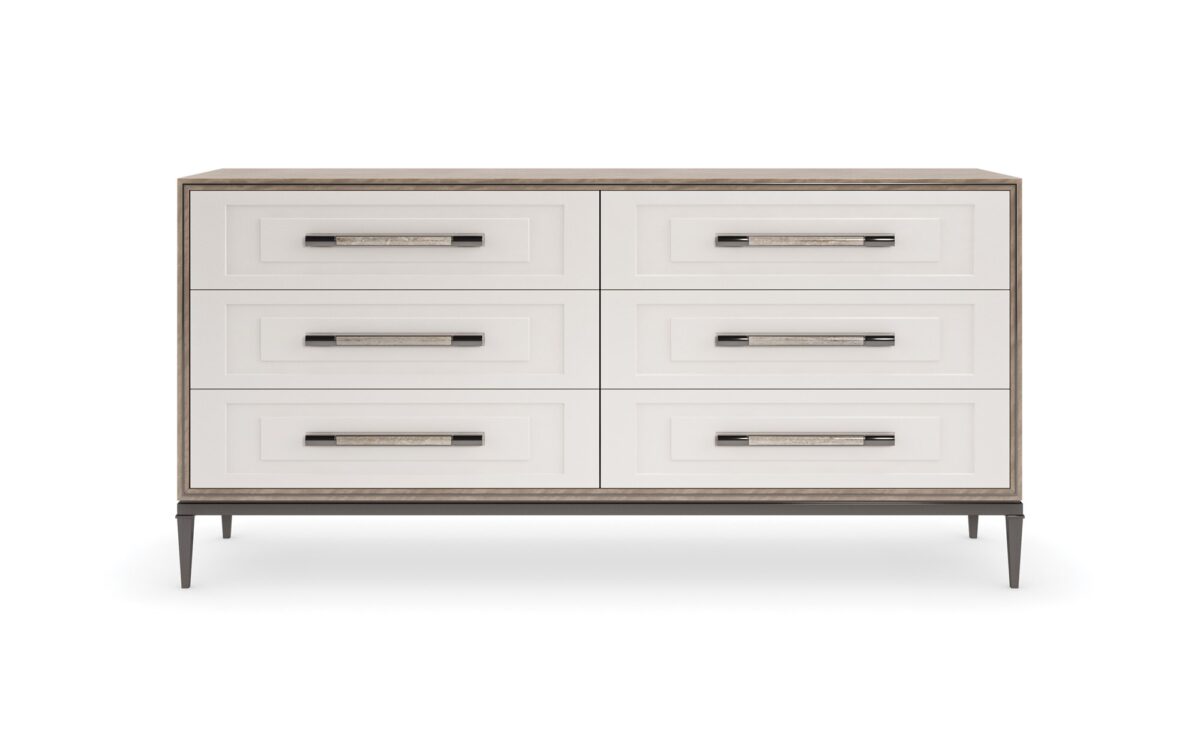 Impressive Dresser by Caracole — a 72″‑wide transitional dresser in Mountain Smoke–finished silver Curupixa veneer, with six stepped Pearly White drawer fronts trimmed in deep bronze metal, featuring jewelry‑style ceramic‑inlay hardware, soft‑close undermount guides, and a coordinating deep bronze metal base.