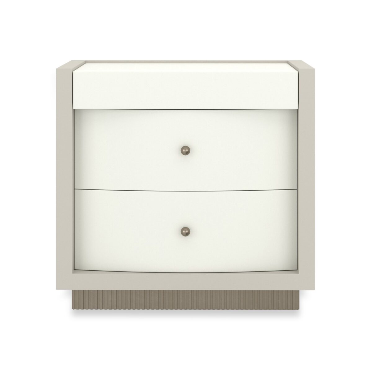 Calais Nightstand by Caracole — a 28″‑wide nightstand featuring a square case in Rockport Burnished Adobe finish with a top in Almond Milk. It includes two bow-front drawers with soft-close undermount guides, small ball-pulls in Brushed Gold, and a reeded base finished in Antique Bronze Leaf. The drawer interiors are painted Almond Milk, and the piece offers hidden openings for power cords.