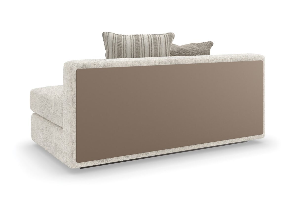 The Unity Armless Loveseat by Caracole (model M140-022-AL1-A) is a refined modular piece from the Caracole Modern Principles collection. It embodies a modern European aesthetic, characterized by clean lines, organic textures, and a harmonious blend of materials.