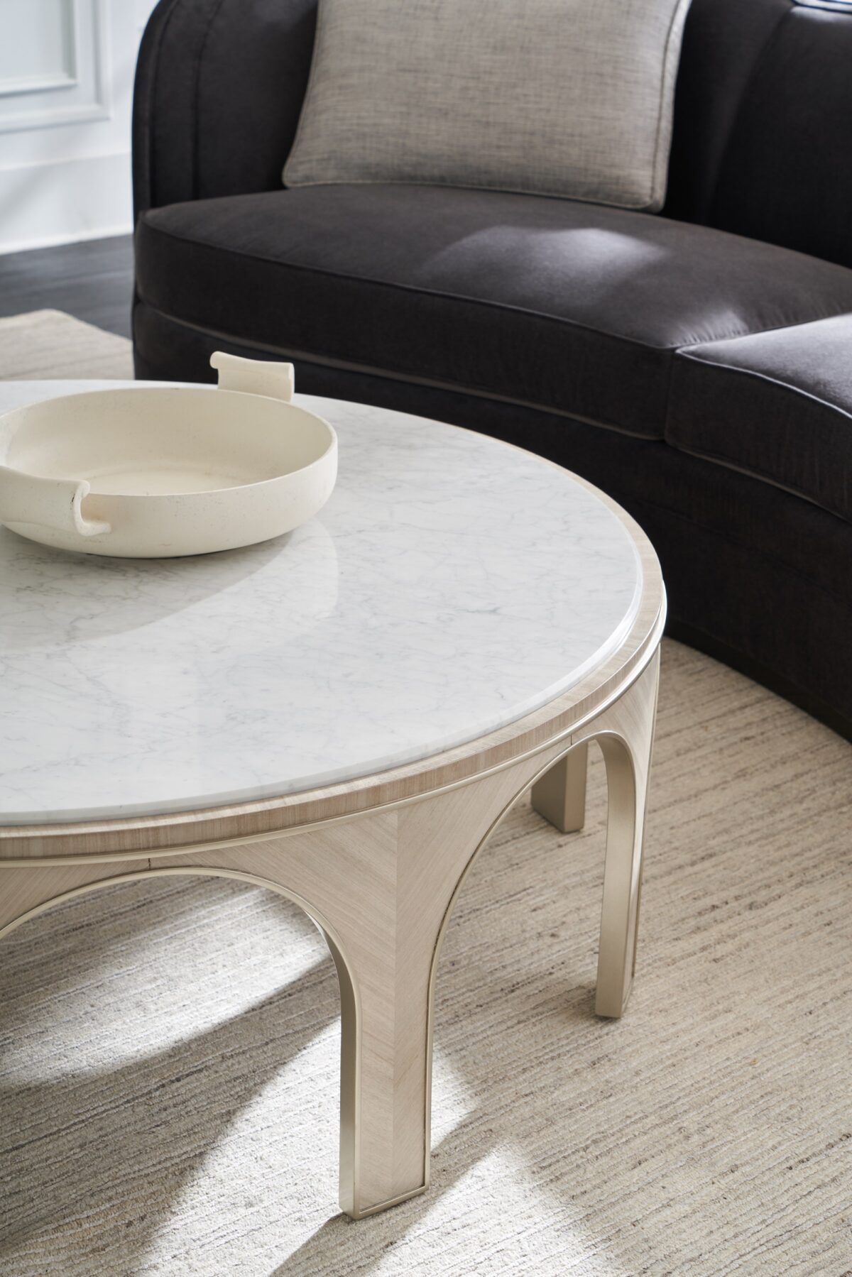 "Sophisticated and contemporary Eclipse Sofa by Caracole, offering luxurious upholstery and sleek lines for a modern, elegant addition to any home."