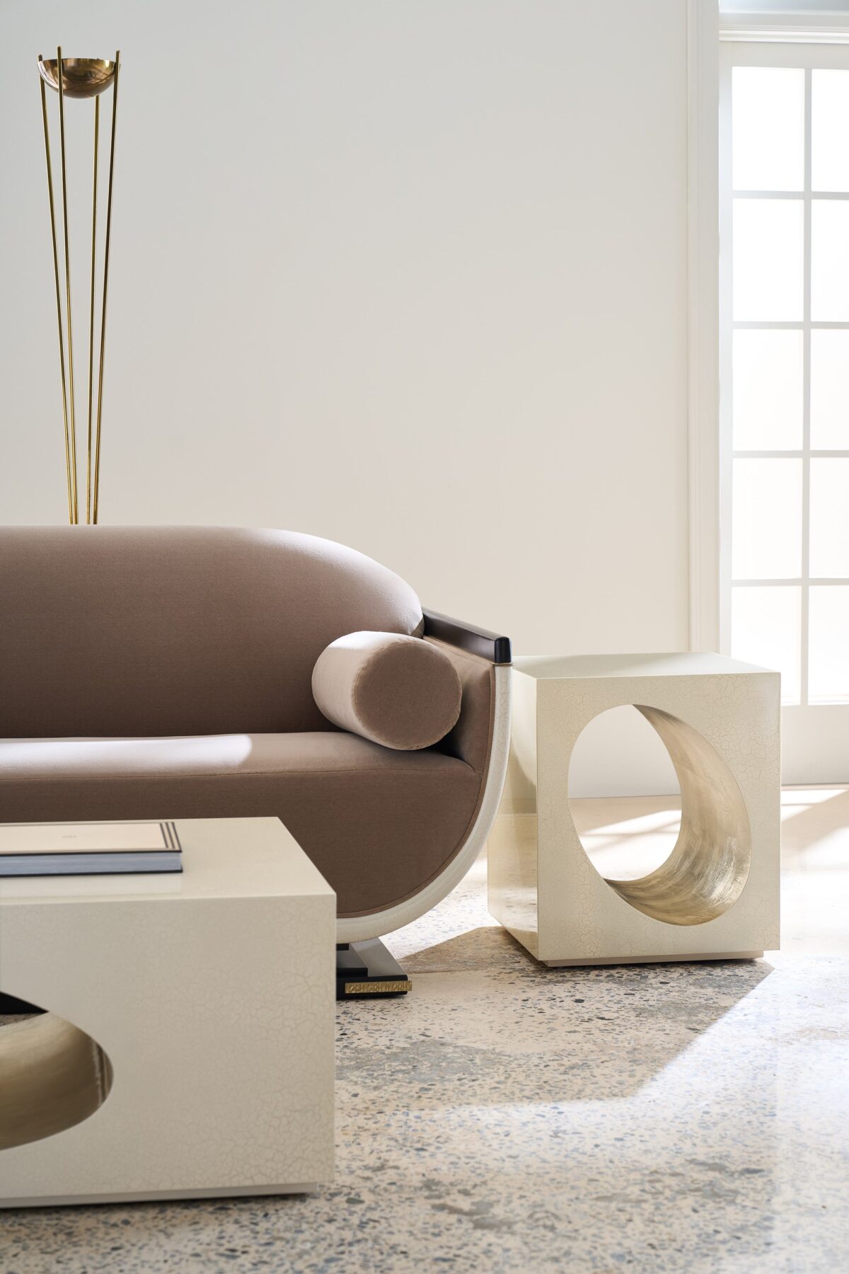 "Elegant Helena Sofa by Caracole, featuring refined lines, plush upholstery, and a modern design that adds sophistication and comfort to any room."