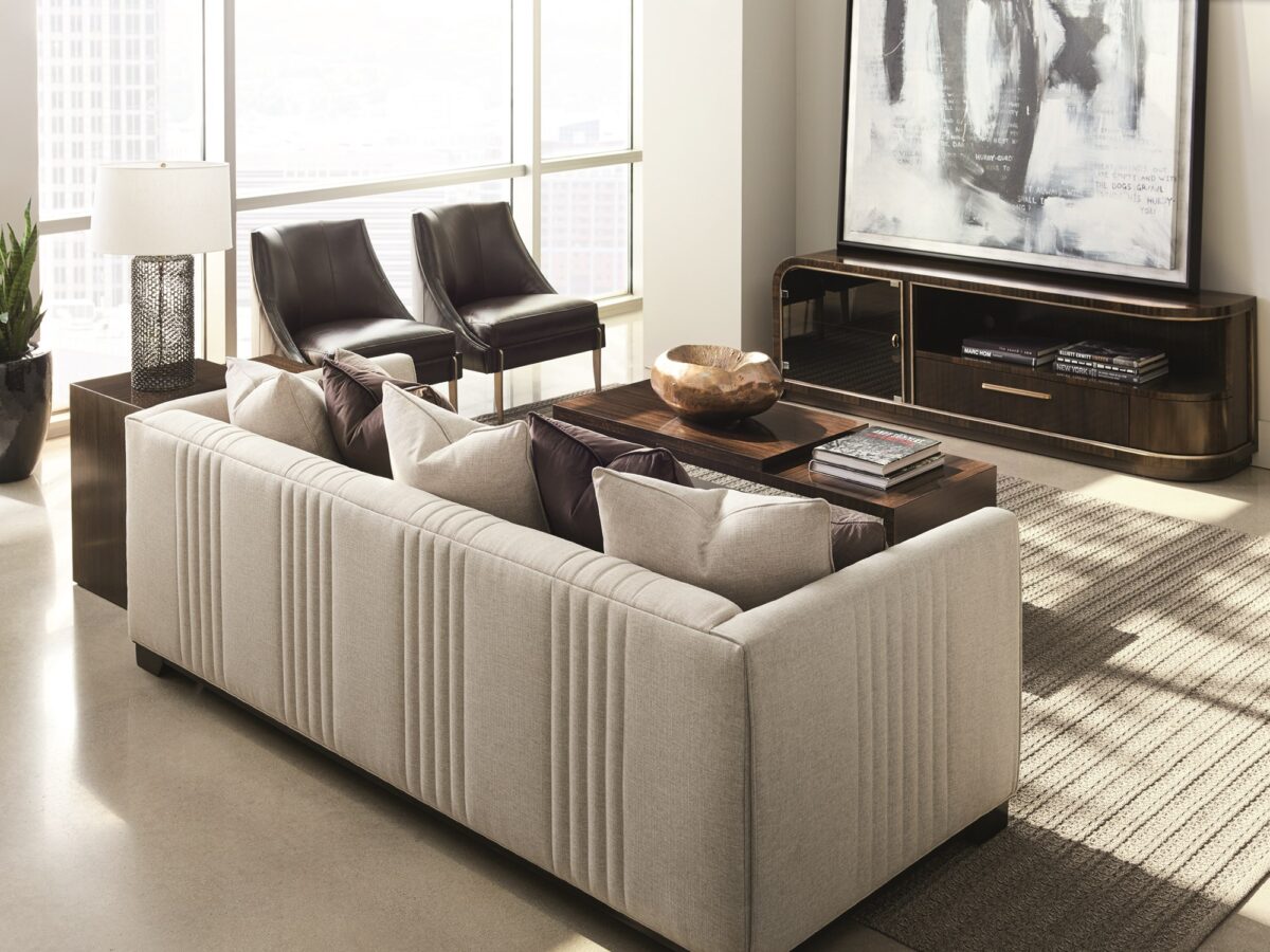"Sleek and sophisticated Moderne Sofa by Caracole, featuring clean lines and luxurious upholstery, perfect for adding a modern touch to any living room."