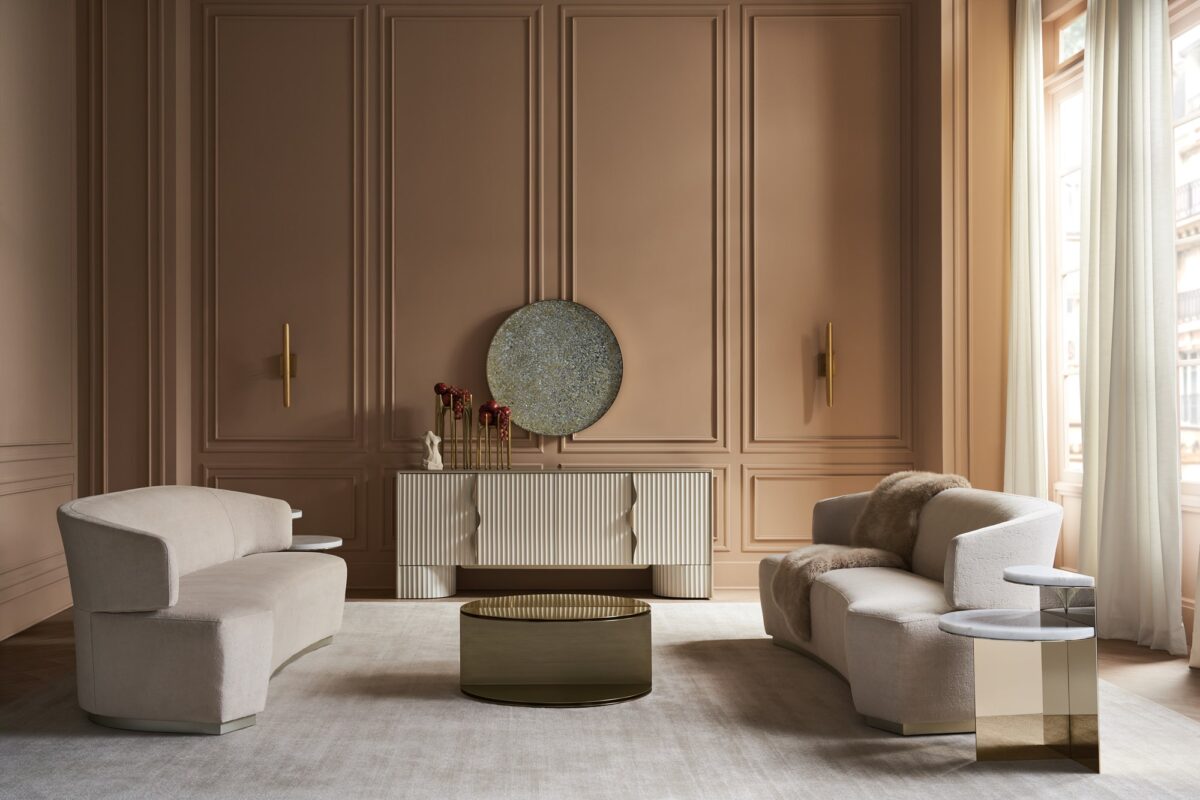 "Elegant and refined Olympia Sofa by Caracole, featuring plush upholstery and a contemporary design that adds timeless sophistication and comfort to any space."