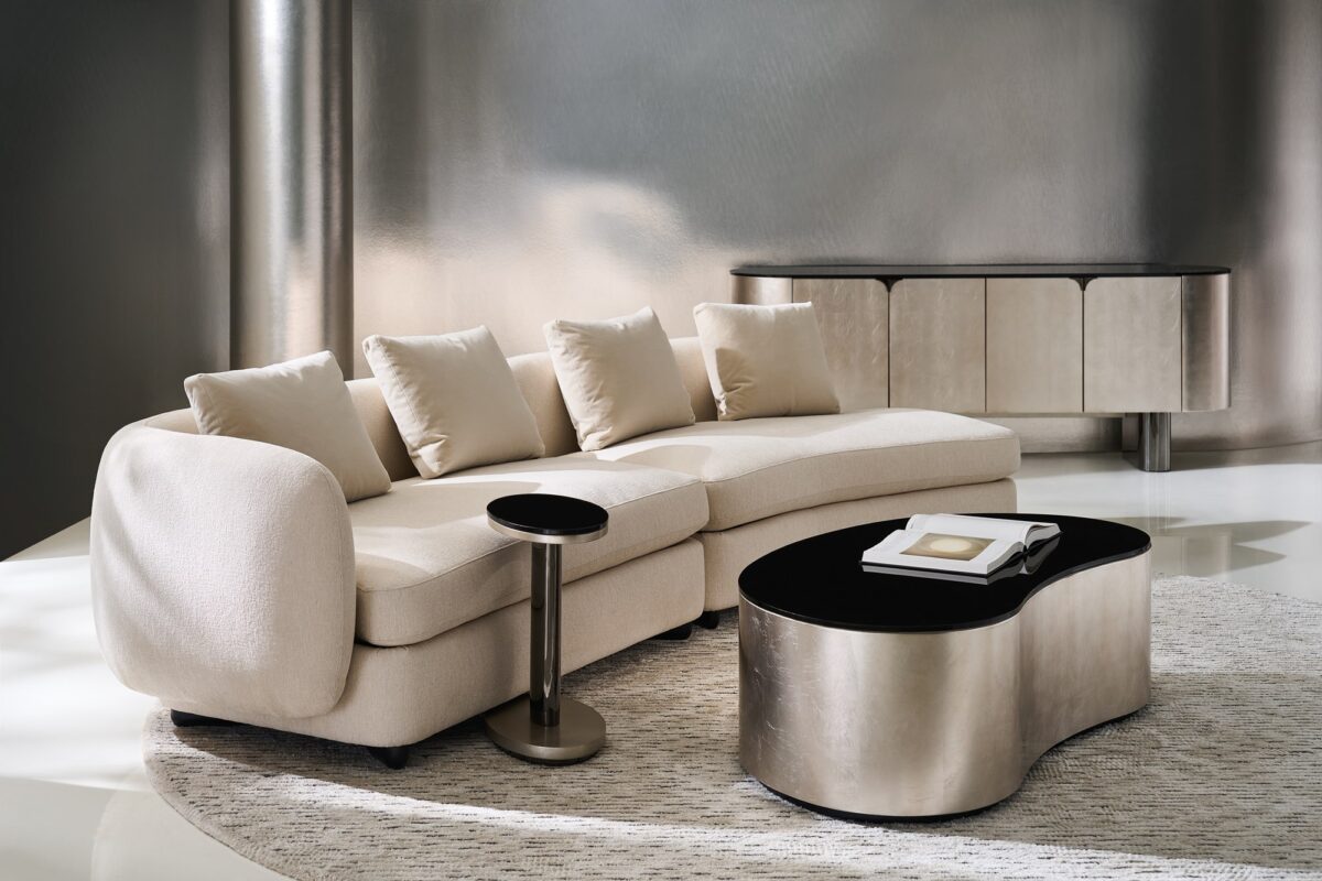 Caracole Lumi RAF Chaise featuring a gently curved silhouette, upholstered in ivory microribbed linen with mohair and wool-blend velvet cushions, and finished with Almost Black pegged wood feet.