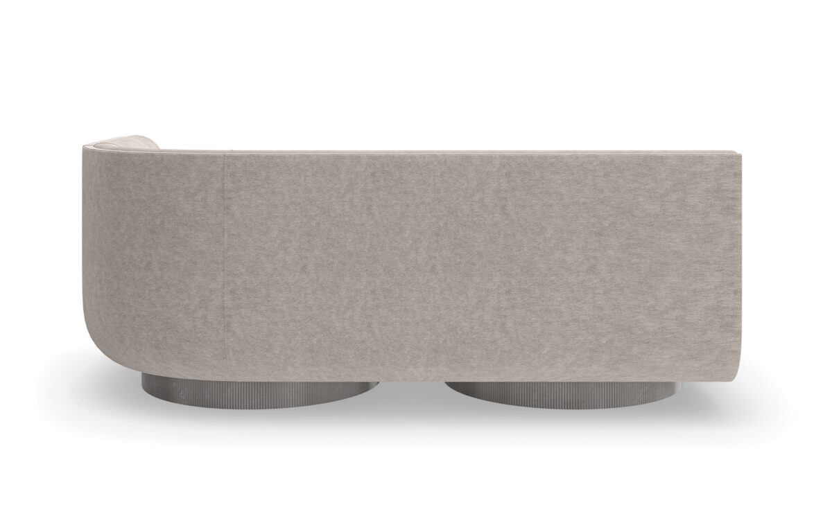 Modern Clipper RAF Sofa from Caracole, with an undulating silhouette and one arm on the right.