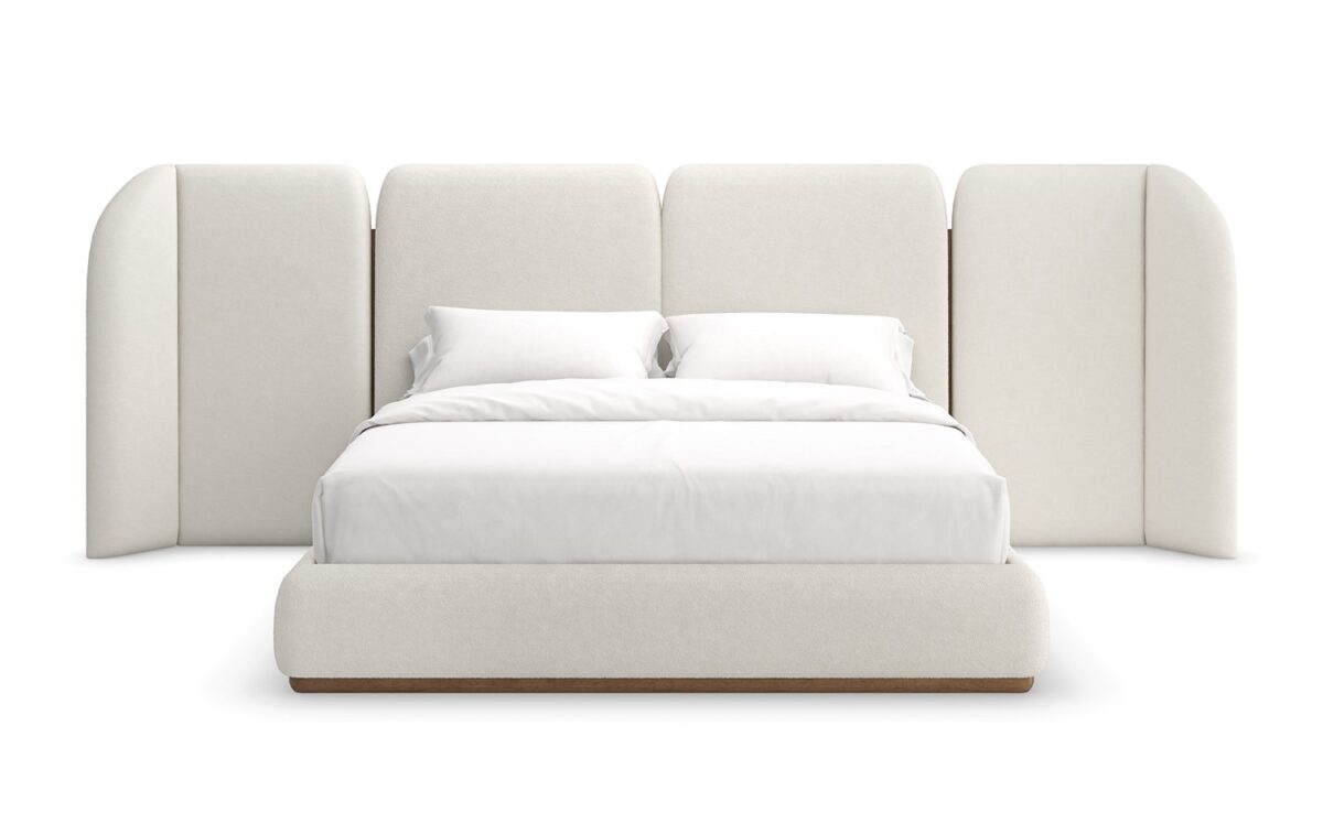 Caracole Malta Upholstered Bed Panels featuring sculptural wing panels fully upholstered in white deep-pile microfiber with Toasted Pecan wood trim, extending the headboard on either side for an architectural yet soft aesthetic.