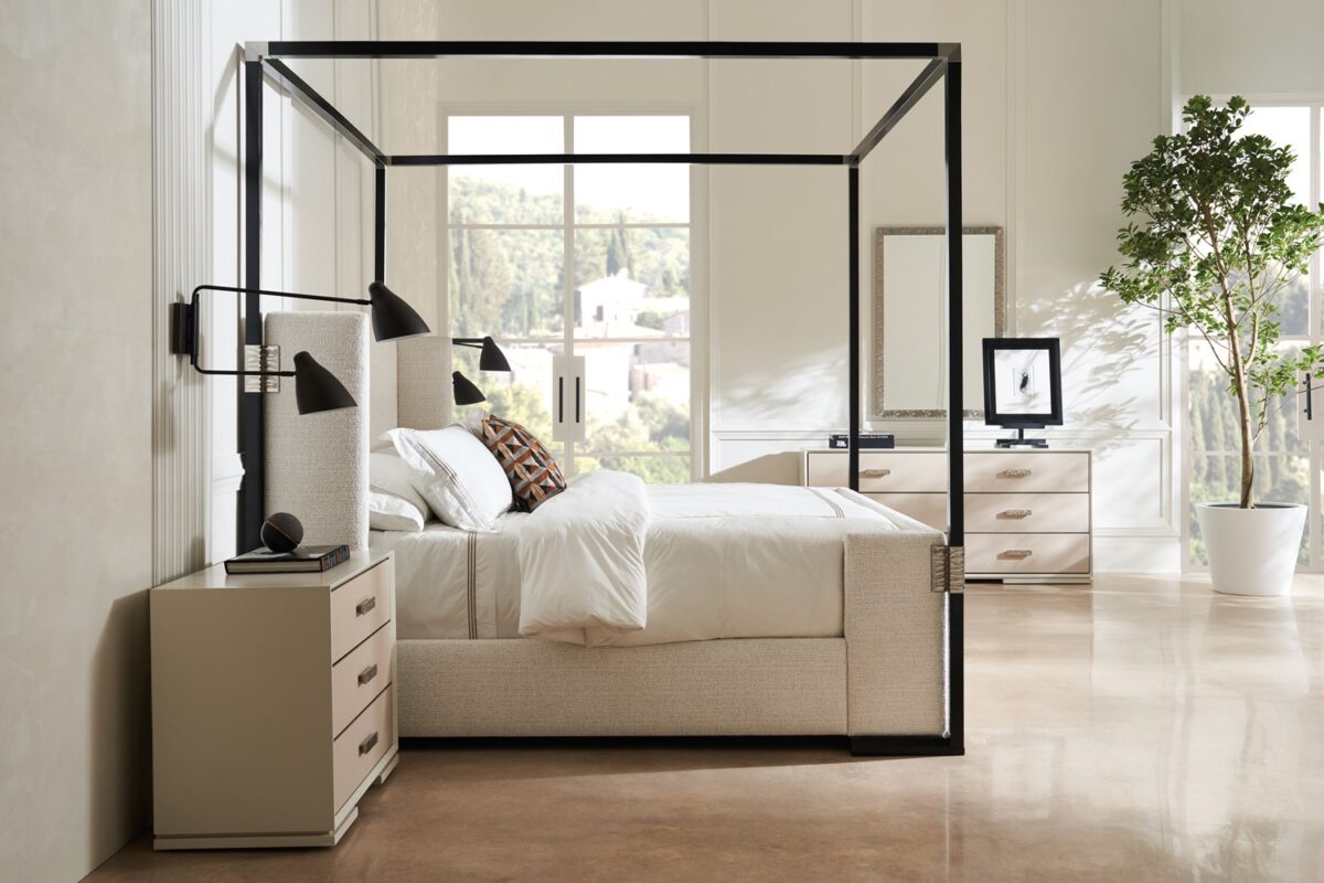 Silver Lining Dresser by Caracole — a 68″‑wide six‑drawer classic dresser in Almond Milk lacquer finish, featuring vinyl-wrapped drawer fronts with a soft blush Venetian silk hue, undulating brushed stainless-steel custom handles, recessed metal trim, soft‑close undermount guides, and UV‑lined linen interiors.