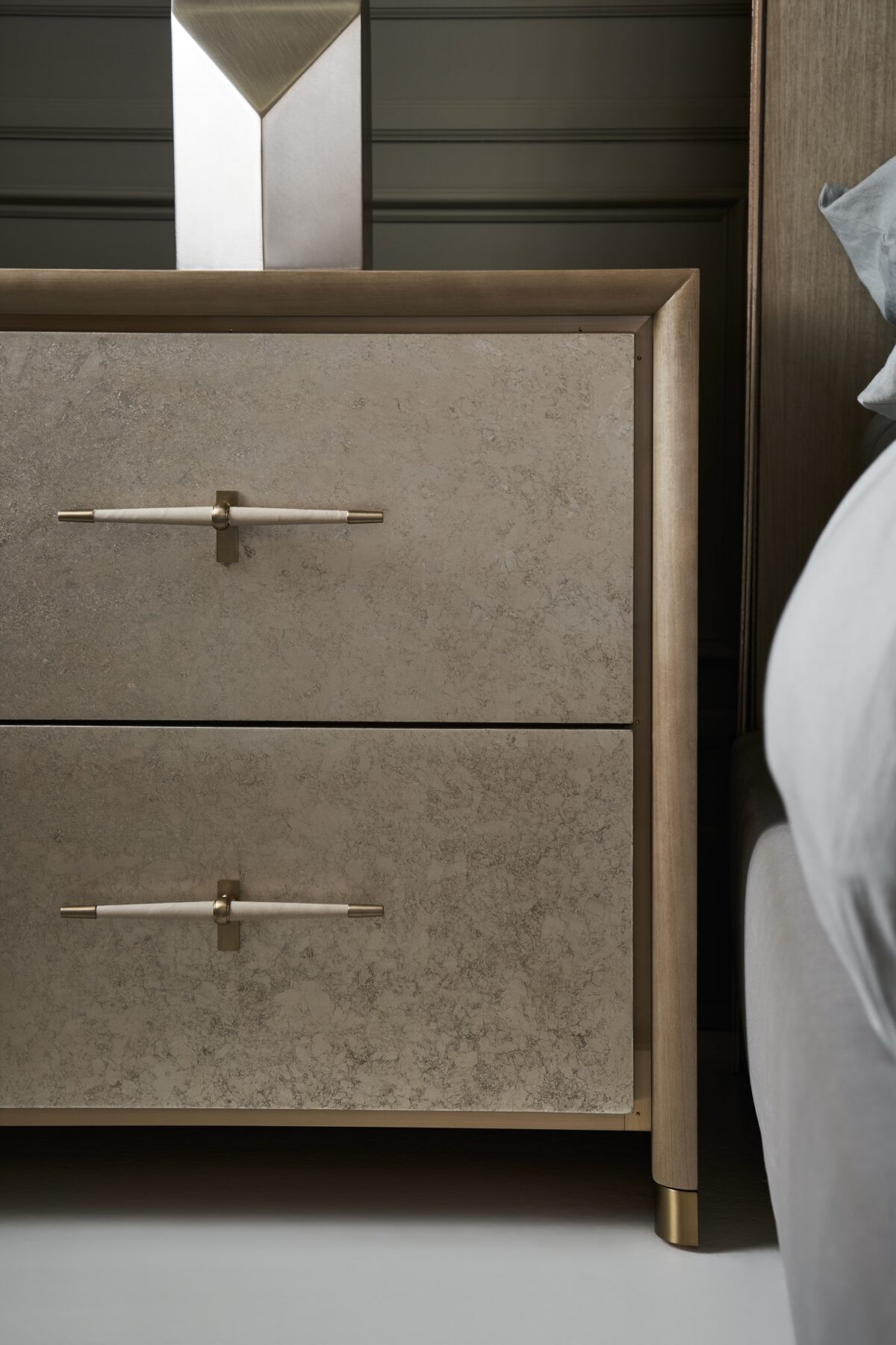 Architectural furniture: The HANG UP Small Nightstand by Caracole, a compact yet elegant piece designed to enhance the style and convenience of a bedroom with its floating design.