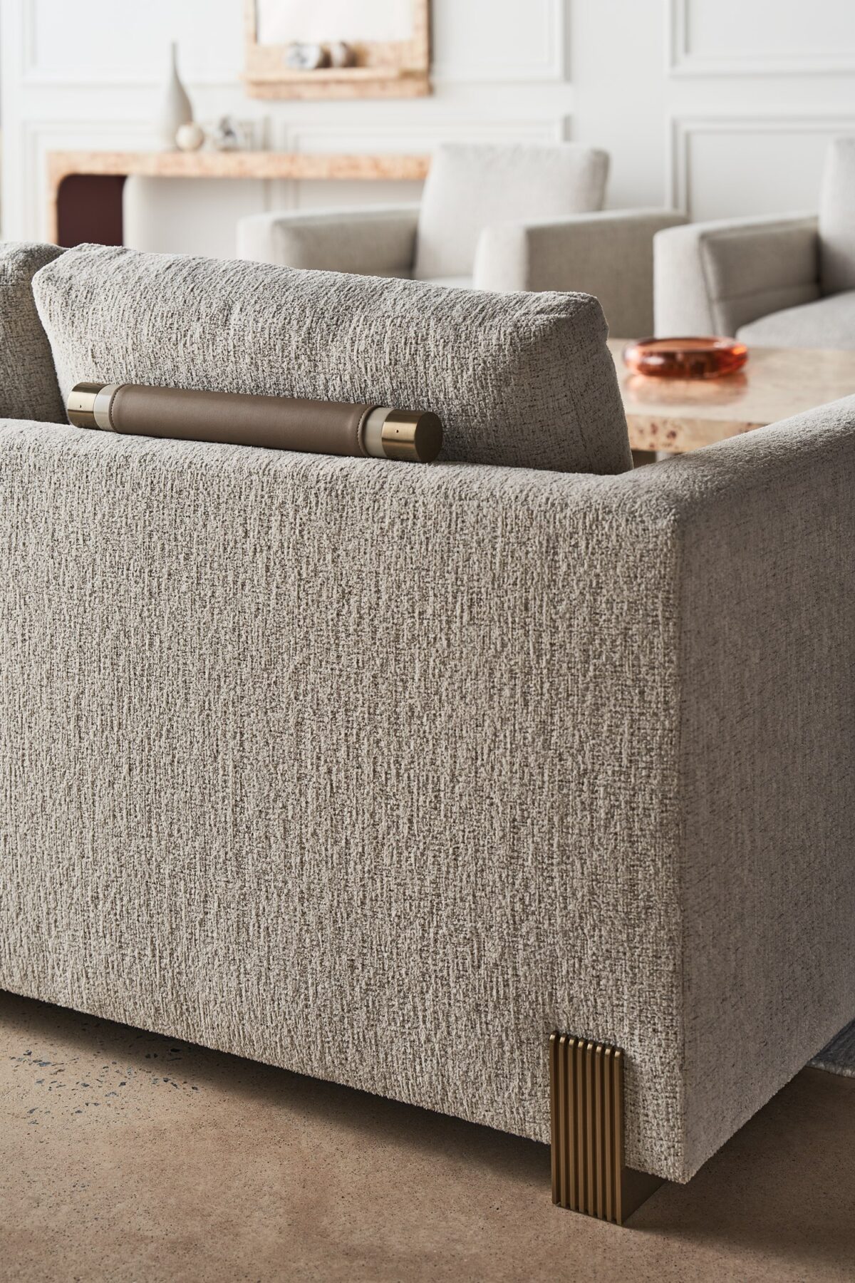 "Modern and elegant Counter Balance Sofa by Caracole, featuring a sleek design with balanced proportions and plush seating for ultimate comfort."