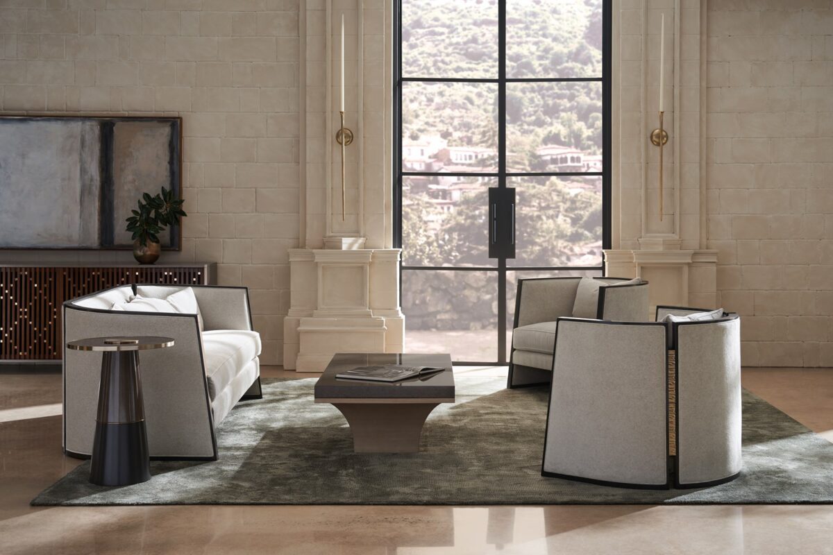 "Chic and contemporary Cut Away Sofa by Caracole, offering a striking design with clean lines and luxurious seating for a modern living space."