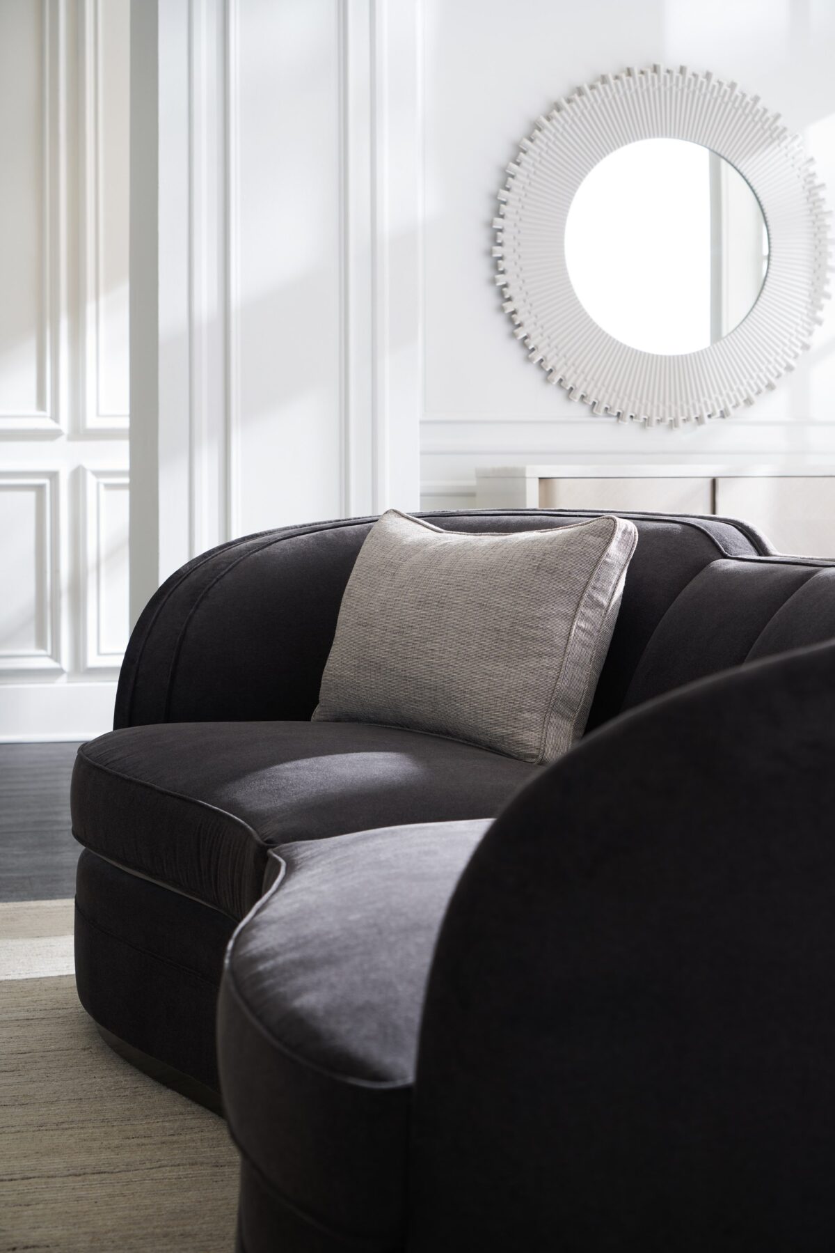 "Sophisticated and contemporary Eclipse Sofa by Caracole, offering luxurious upholstery and sleek lines for a modern, elegant addition to any home."