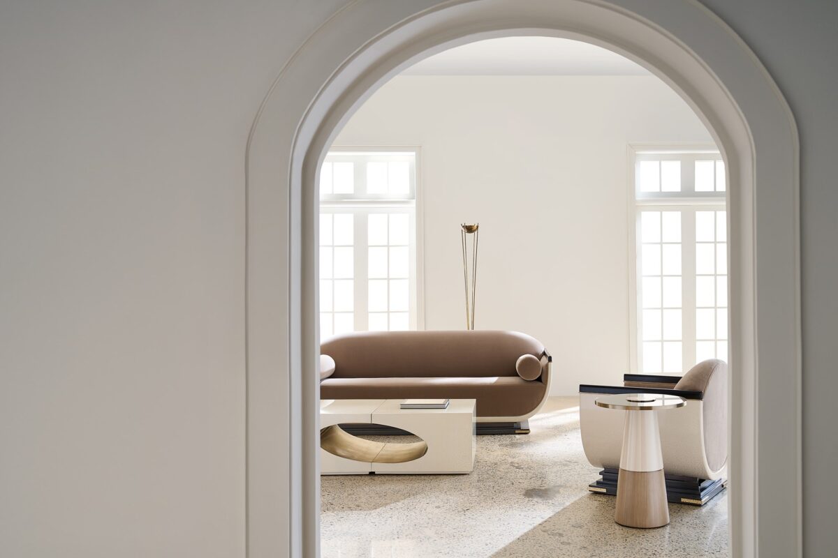 "Elegant Helena Sofa by Caracole, featuring refined lines, plush upholstery, and a modern design that adds sophistication and comfort to any room."