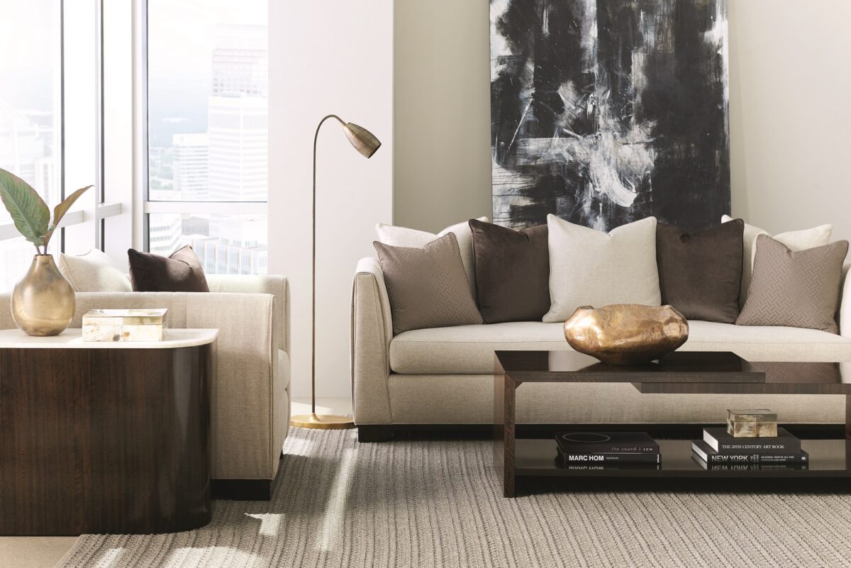 "Sleek and sophisticated Moderne Sofa by Caracole, featuring clean lines and luxurious upholstery, perfect for adding a modern touch to any living room."