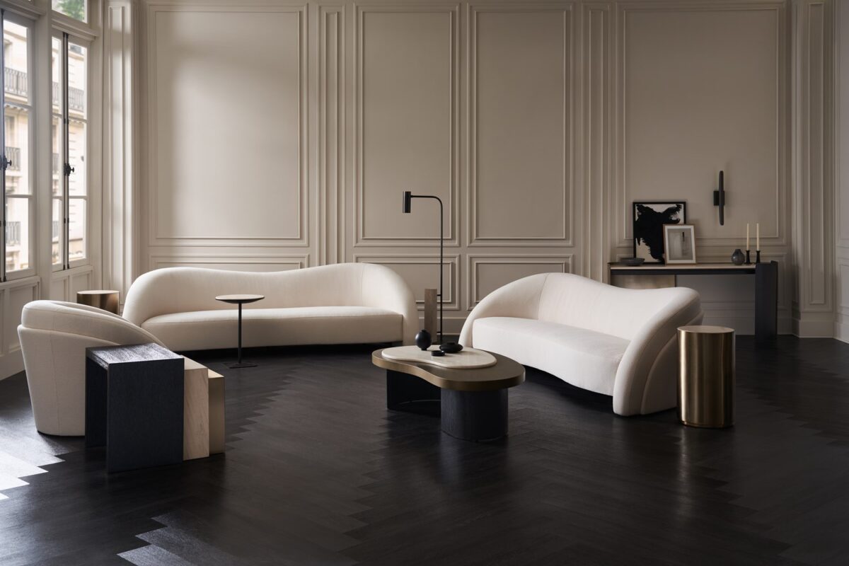 "Elegant and dynamic Movement Sofa by Caracole, featuring a modern design with plush cushions and sleek lines to elevate the style and comfort of any space."