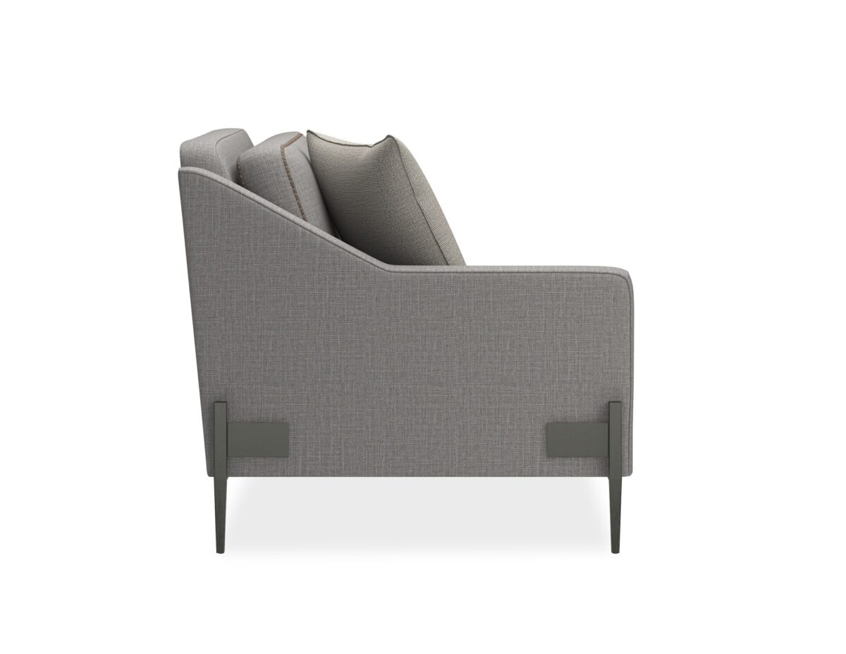 A sleek left-arm chair with a suspended frame, Smoked Stainless metal legs, and grey wool blend upholstery with tan leather welt.