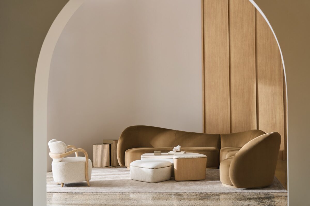 Caracole Kalahari Wedge featuring a triangular design, fully upholstered in camel-colored angora-like velvet, with a base finished in Sparkling Argent, designed to seamlessly connect two Kalahari sofas in an L-shaped sectional.