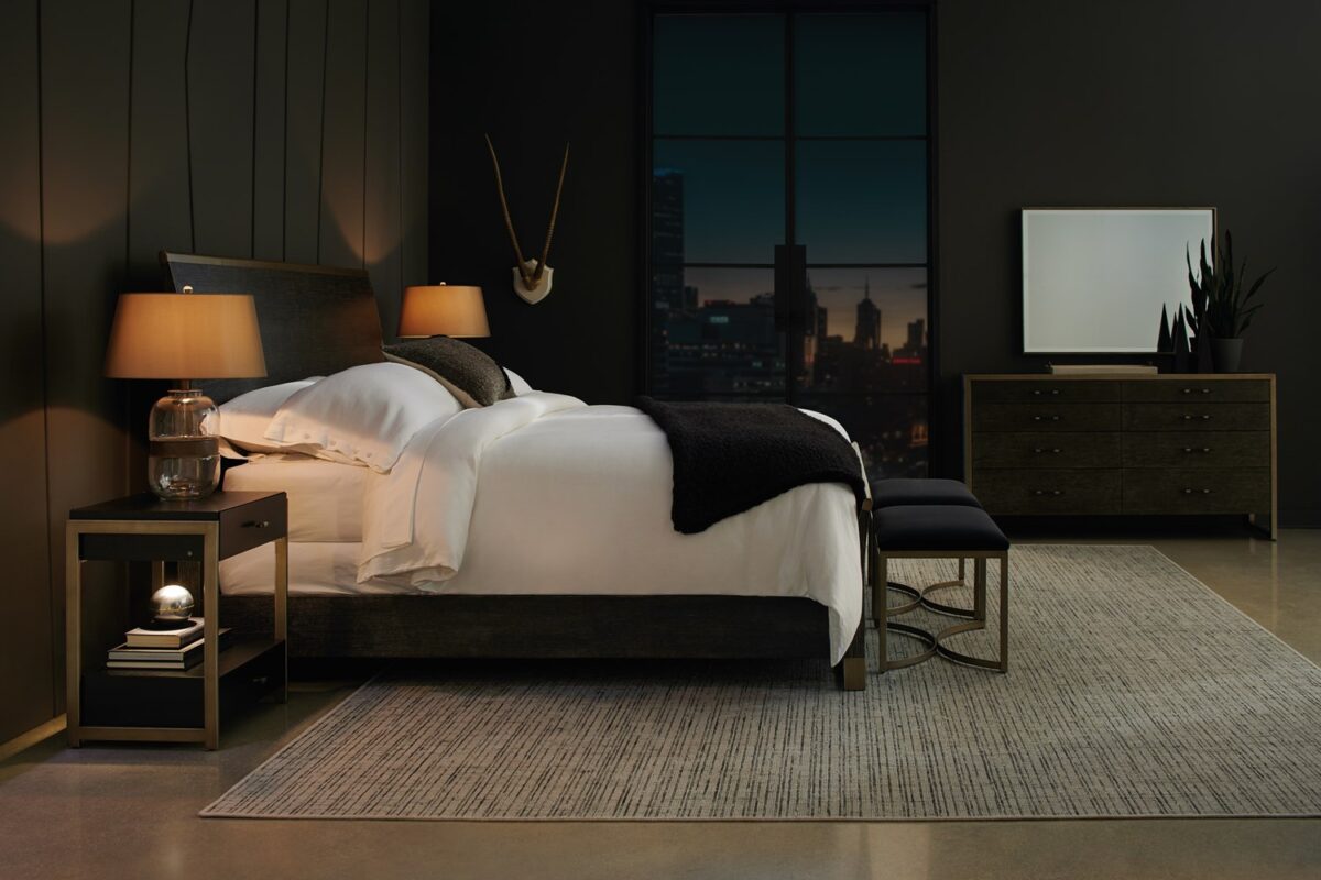 Caracole ReMix Wood King Bed featuring a Cerused Oak frame with a slightly curved profile, accented by Bronze Gold Metal rails outlining the top of the headboard and footboard, and a geometric bottom frame.
