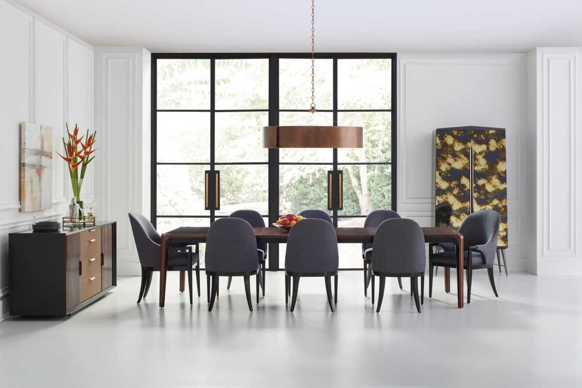 Contemporary ALL WRAPPED UP chest by Caracole, showcasing its clean lines and a subtle metallic trim or base that complements its wrapped exterior.
