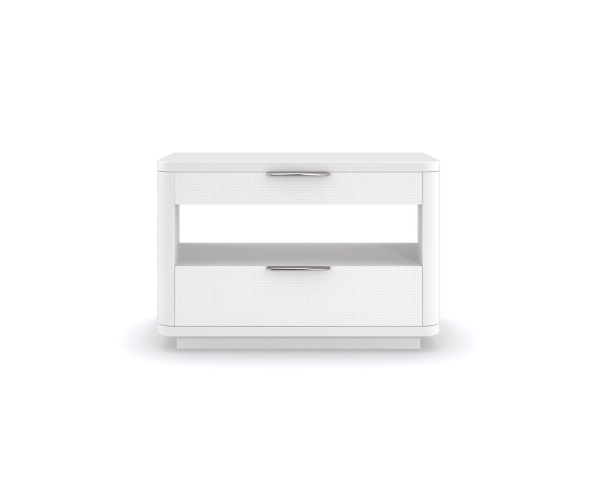 In Touch by Caracole" refers to a bedside table/nightstand. It's characterized by rounded edges, a clean-lined "Cloud White" finish, carved drawer fronts with a "woven mini-tile motif," finger-cup pulls in Satin Nickel, two drawers, and open center storage with a built-in light, a USB port, and wire management holes.