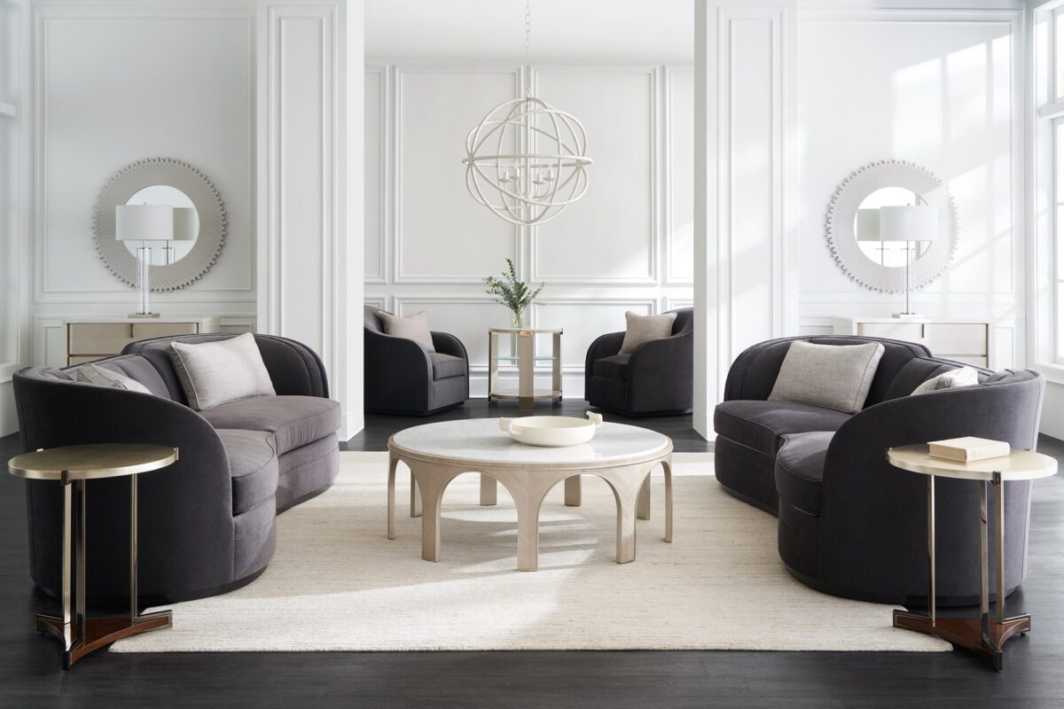 "Sophisticated and contemporary Eclipse Sofa by Caracole, offering luxurious upholstery and sleek lines for a modern, elegant addition to any home."