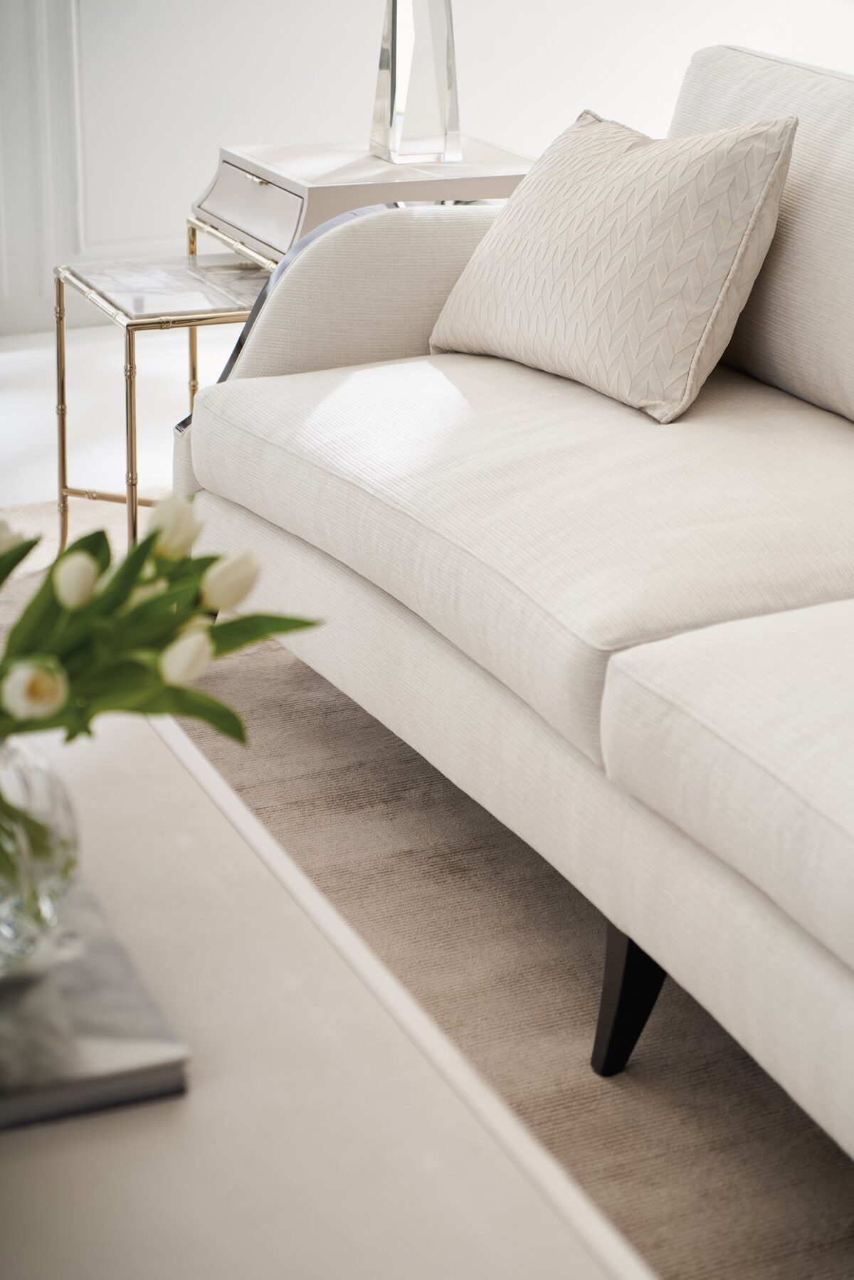 "Elegant and refined Pitch Perfect Sofa by Caracole, featuring sleek lines, plush cushions, and a modern design that enhances any contemporary living space."