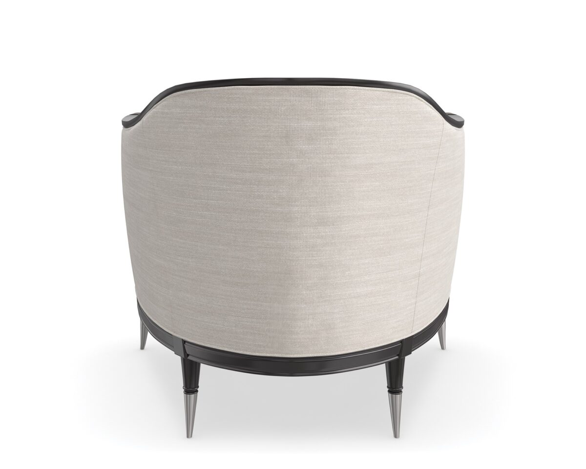 "Chic and bold Splash of Flash Chair by Caracole, featuring a striking design with luxurious upholstery and modern details that make a sophisticated statement in any space."