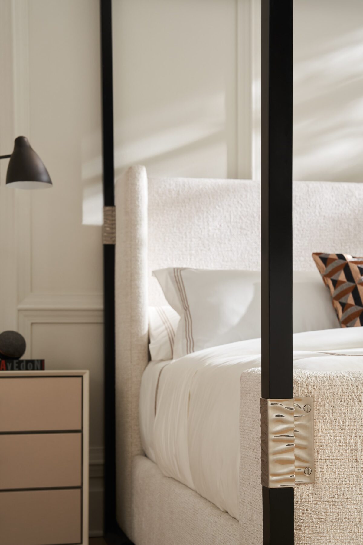 Caracole Shelter Me King Bed Canopy featuring a clean-lined frame finished in Almost Black, complemented by decorative Brushed Stainless textured brackets on the footboard, designed to pair with the CLA-423-25 King Bed.