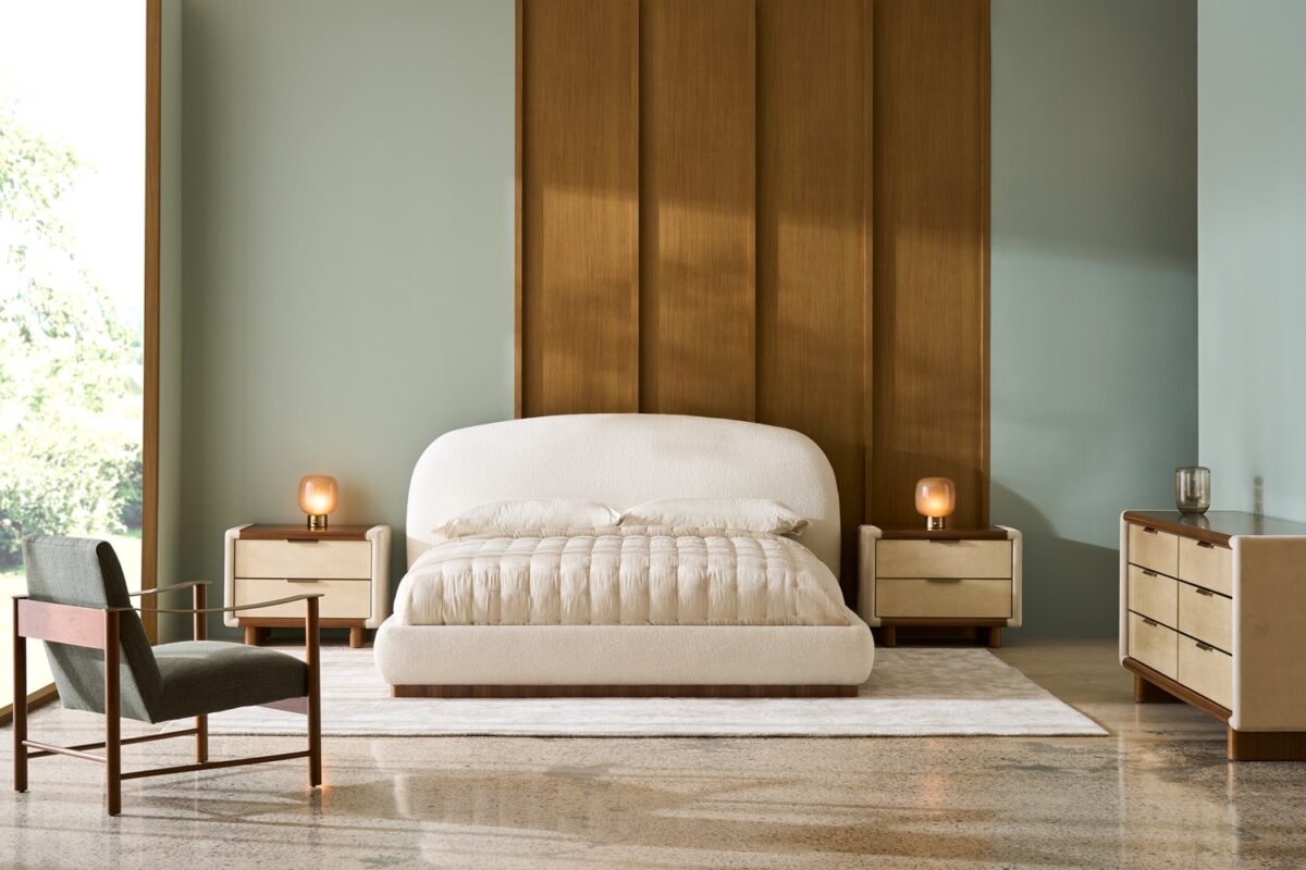 Botero Large Nightstand by Caracole — a 32″‑wide mixed‑media square nightstand with bullnose‑rounded edges, featuring a Retro Walnut top, base, and rounded plank legs; two generous smoked‑Birdseye Maple drawer fronts with swirling grain; stone‑tone micro‑suede wrapped ends; slender Brushed‑Gold metal trim and integrated bullnose‑curved pulls; and soft‑close drawers with UV‑Linen interiors.