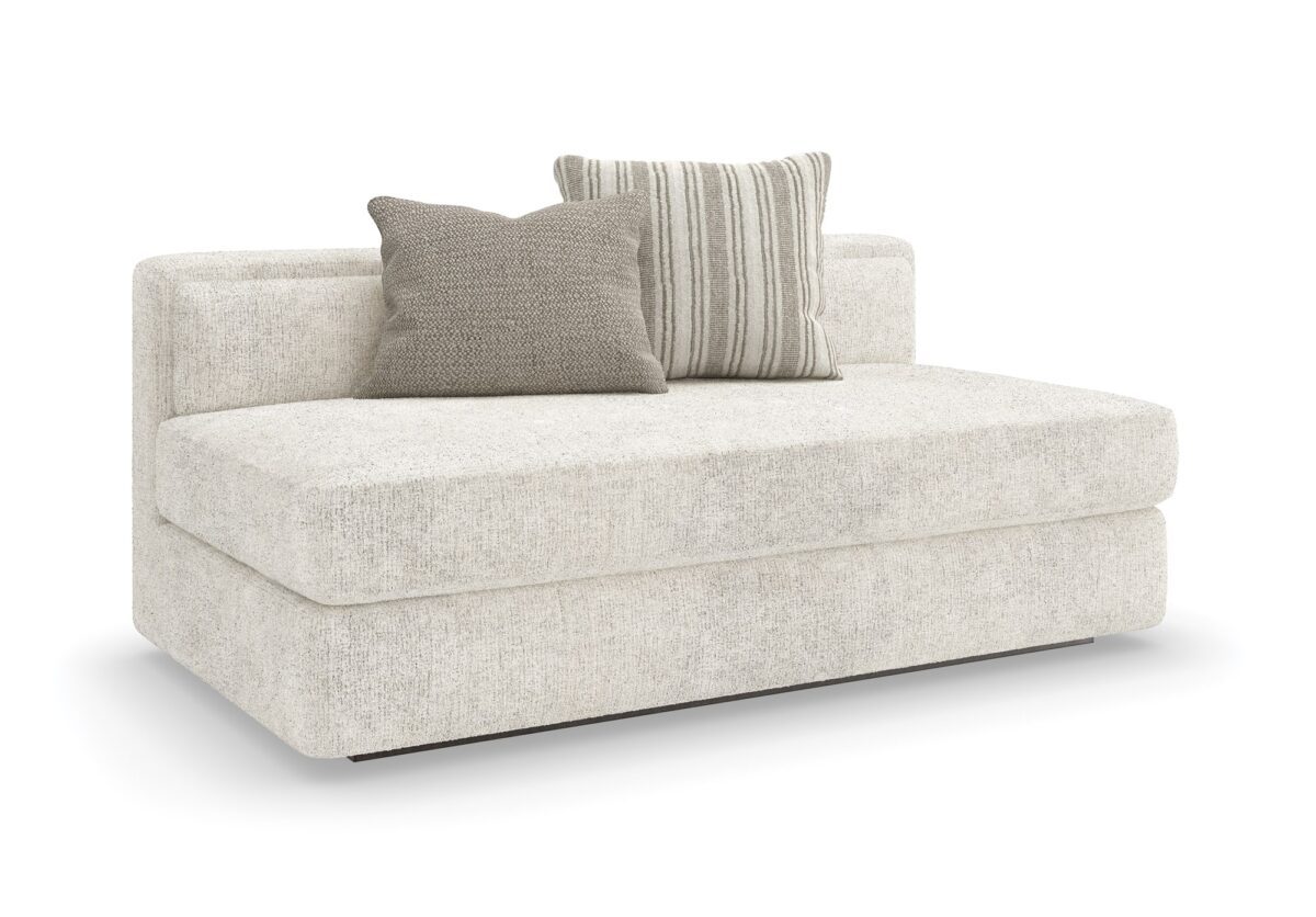 The Unity Armless Loveseat by Caracole (model M140-022-AL1-A) is a refined modular piece from the Caracole Modern Principles collection. It embodies a modern European aesthetic, characterized by clean lines, organic textures, and a harmonious blend of materials.