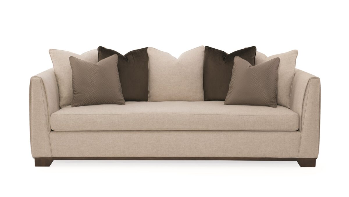 "Sleek and sophisticated Moderne Sofa by Caracole, featuring clean lines and luxurious upholstery, perfect for adding a modern touch to any living room."