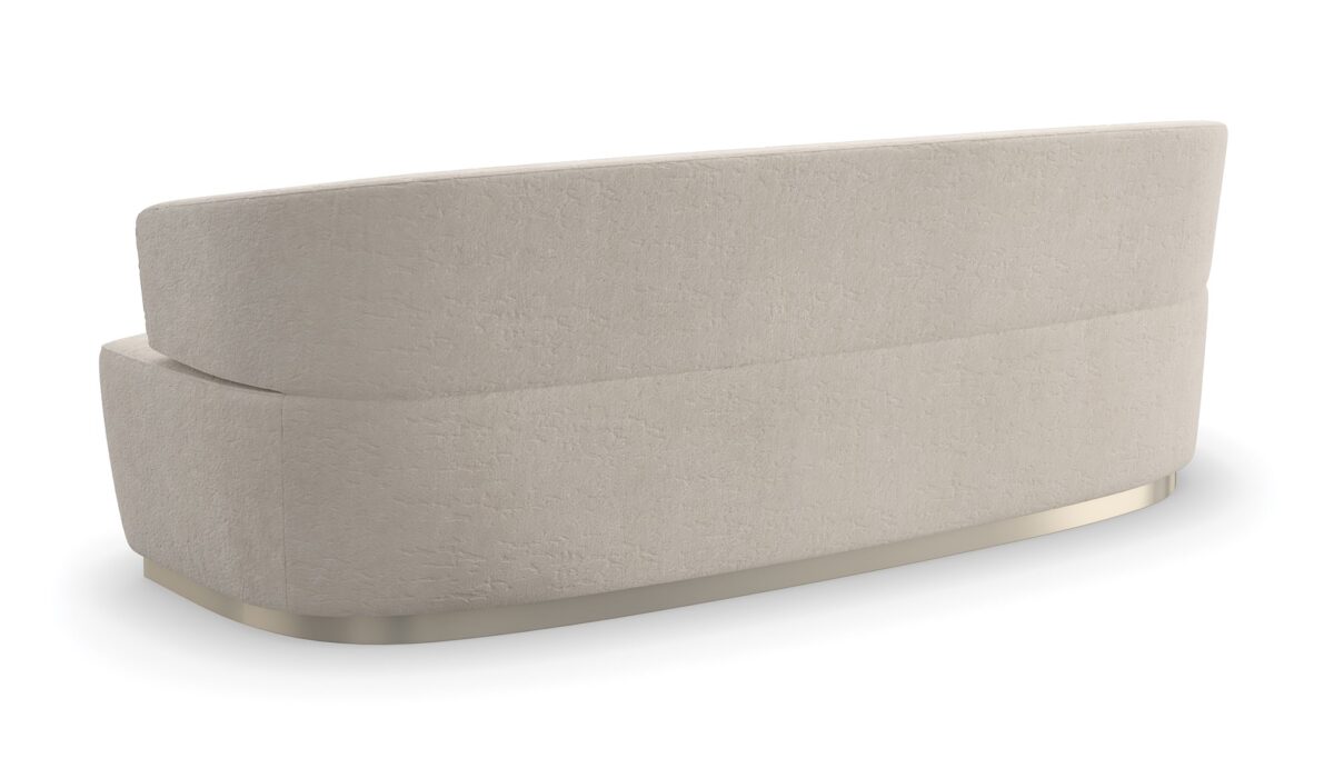 "Elegant and refined Olympia Sofa by Caracole, featuring plush upholstery and a contemporary design that adds timeless sophistication and comfort to any space."