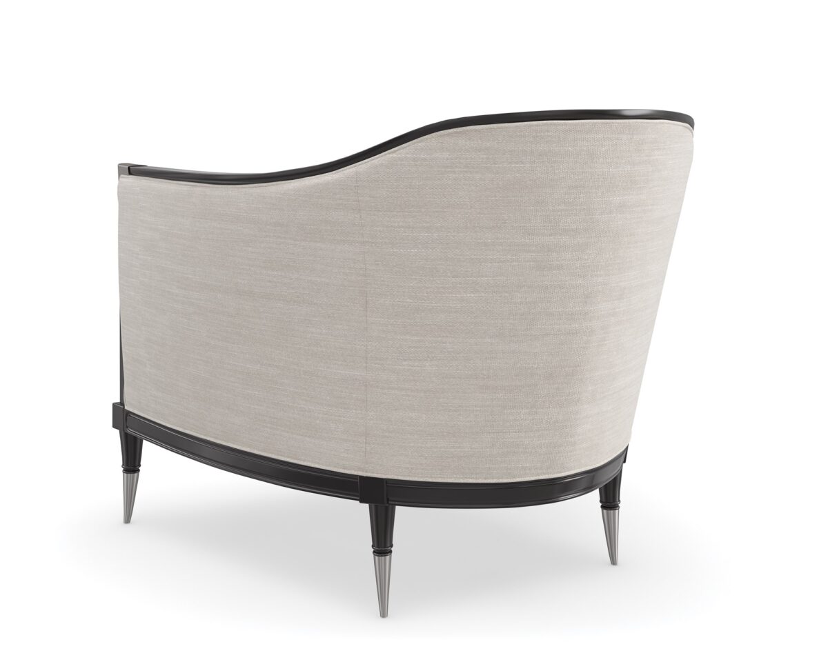 "Chic and bold Splash of Flash Chair by Caracole, featuring a striking design with luxurious upholstery and modern details that make a sophisticated statement in any space."