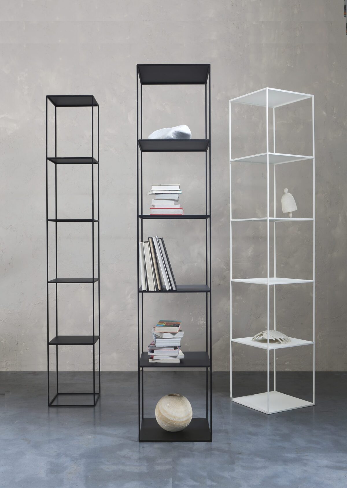 Tall minimalist column shelf with slim steel structure by Zeusnoto.