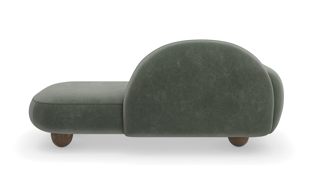 The Cypress Chaise by Caracole (model M150-023-071-A) is a luxurious, Memphis-inspired piece that combines sculptural elegance with plush comfort. Its cloud-like silhouette and rich verdigris mohair-velvet upholstery make it a standout addition to any interior.