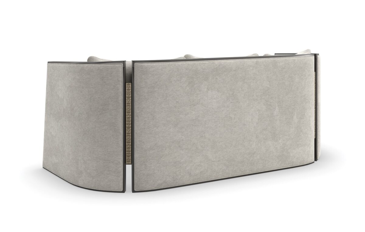 "Chic and contemporary Cut Away Sofa by Caracole, offering a striking design with clean lines and luxurious seating for a modern living space."