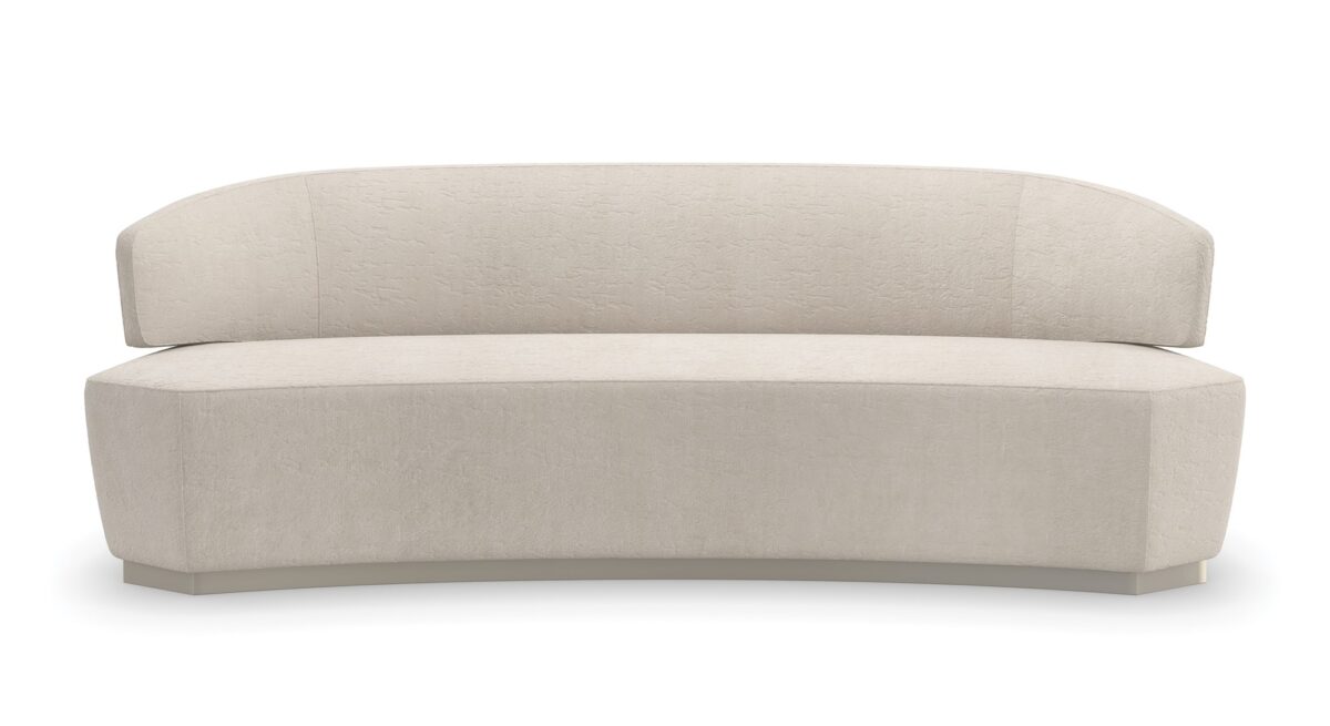 "Elegant and refined Olympia Sofa by Caracole, featuring plush upholstery and a contemporary design that adds timeless sophistication and comfort to any space."