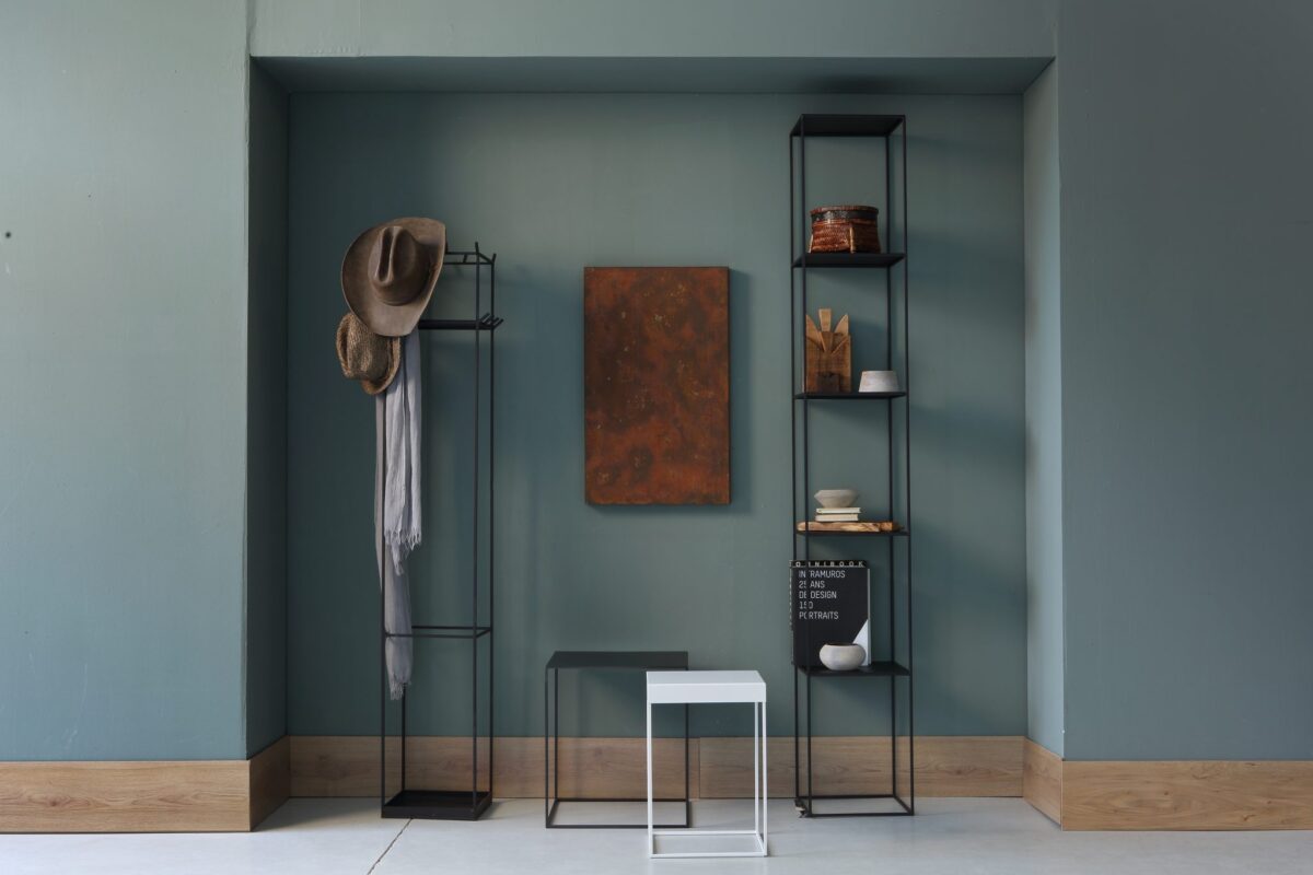 Tall minimalist column shelf with slim steel structure by Zeusnoto.
