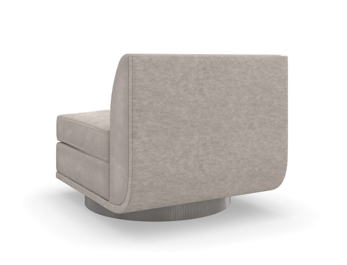 Clipper armless chair from Caracole, showcasing its distinctive curved back and upholstered in two-tone fabric.
